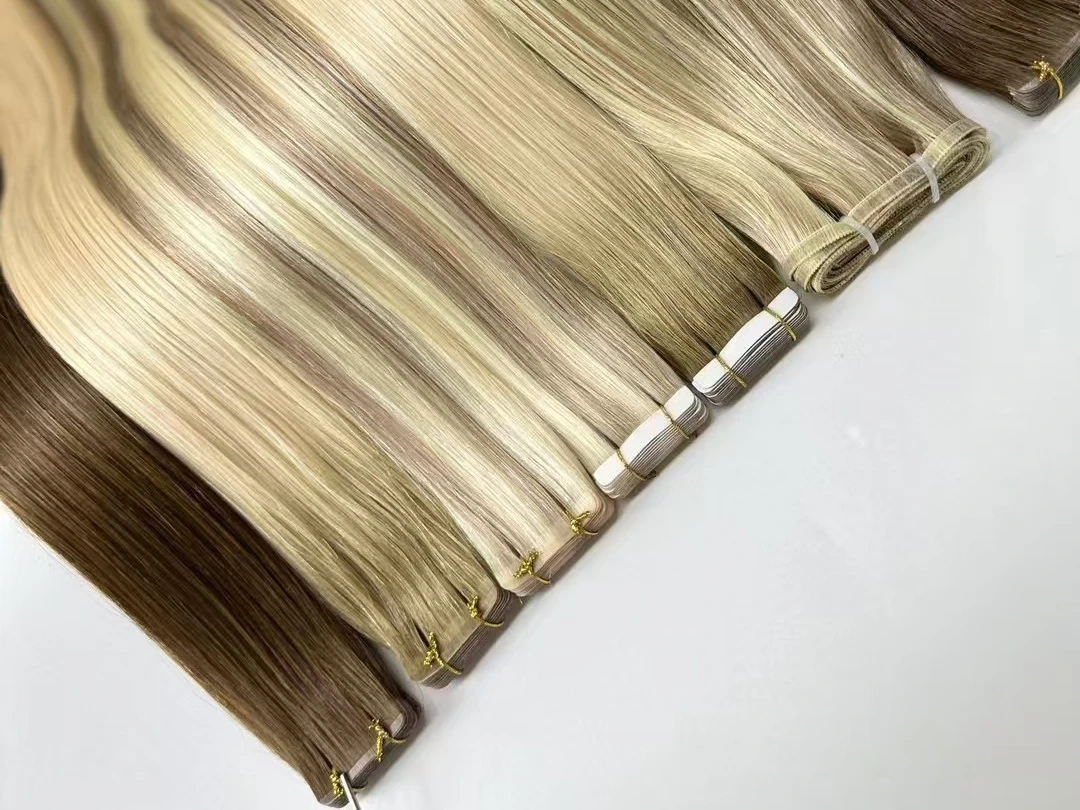 Pedido de extensiones de cabello con cinta premium completado y enviado al cliente del Reino Unido